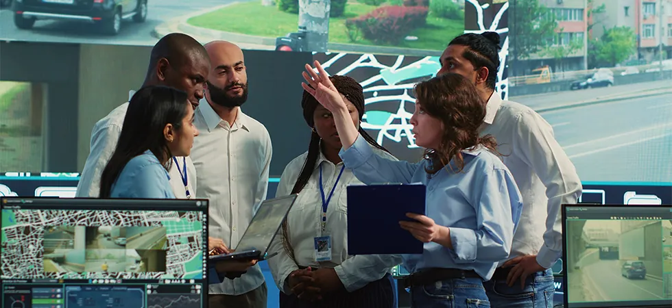 Sustainable telecom BPO support team monitoring energy-efficient network operations and telecom infrastructure