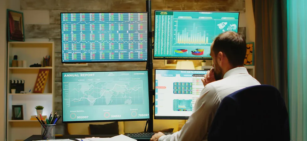 MOP CHG record management specialist tracking change control data across multiple monitoring screens