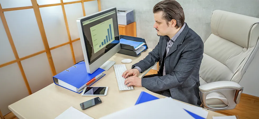 Collections specialist managing active account collections performance metrics on a desktop dashboard