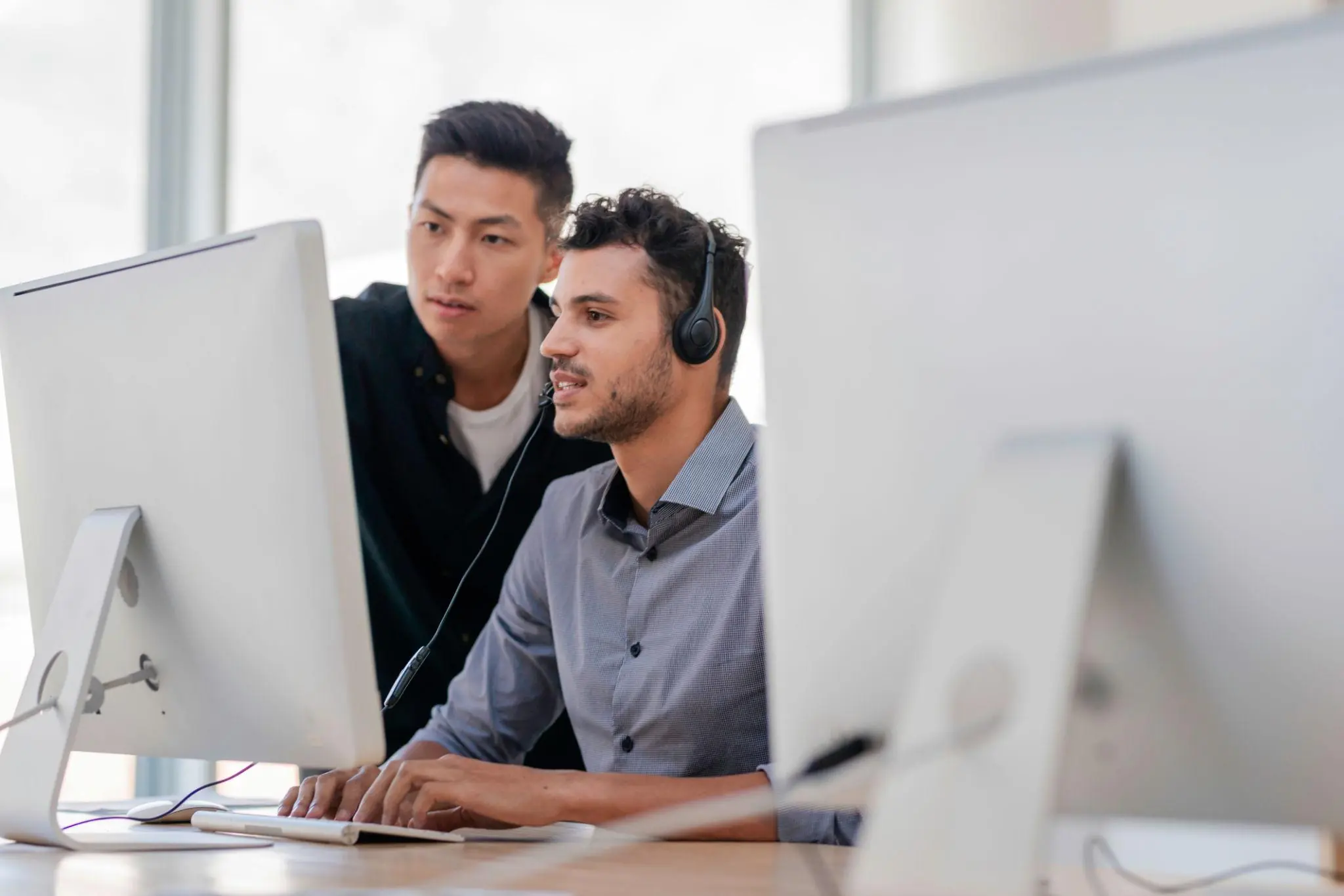 Telecom onboarding support services team assisting customer activation and onboarding support to improve retention and lifetime value.